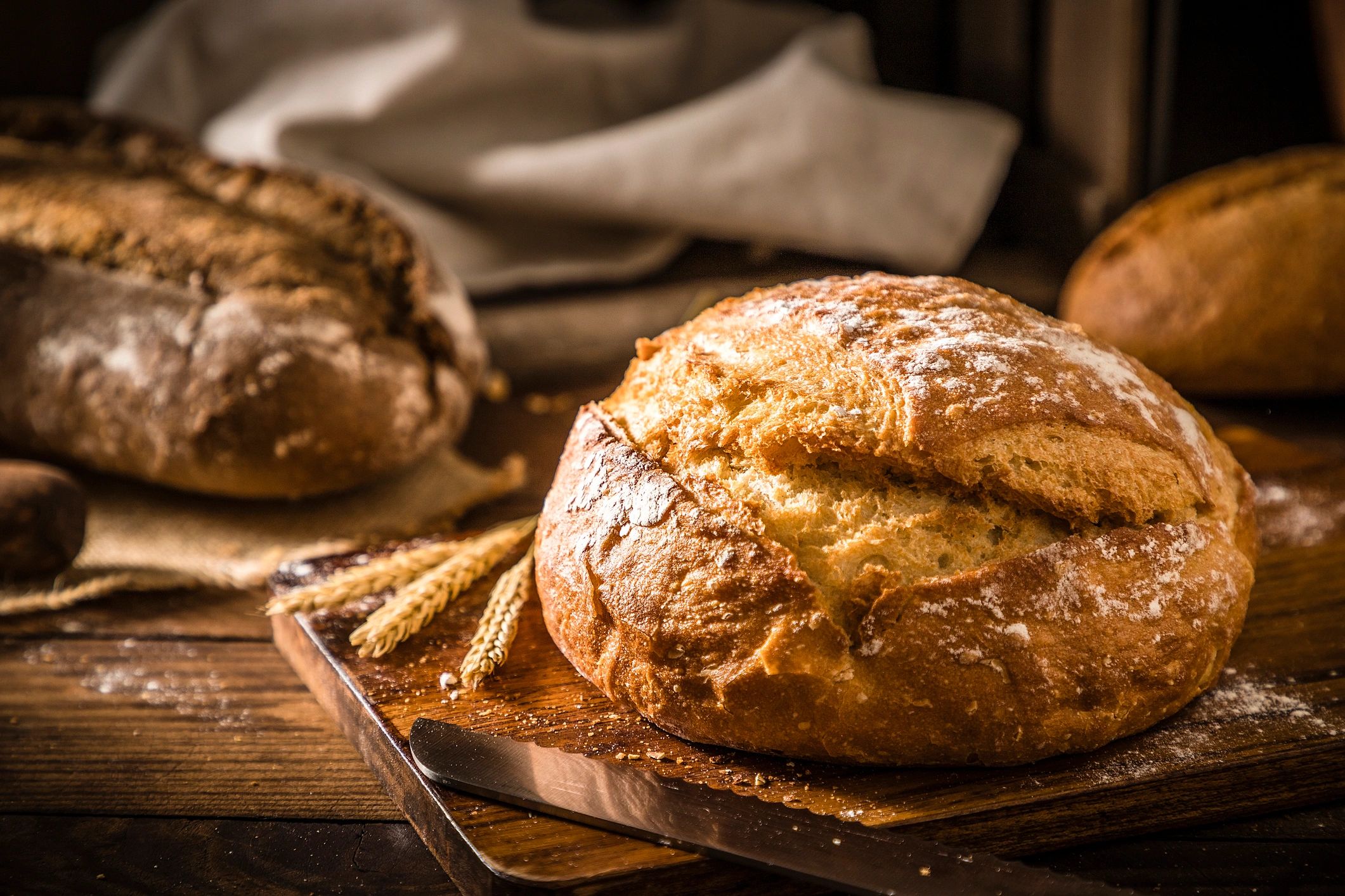 fresh artisan bread on rustic table